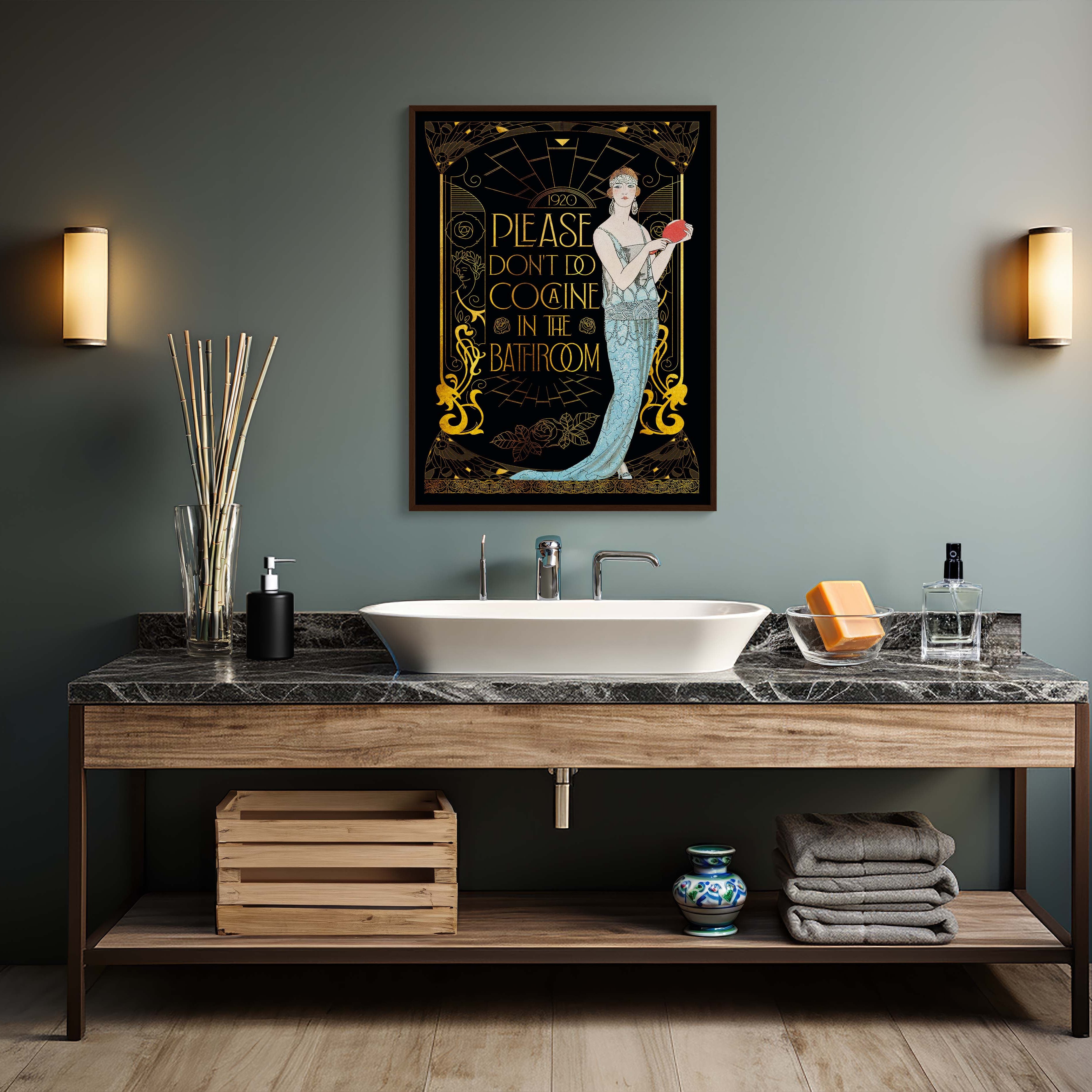 Bathroom with wooden vanity, white sink, and decorative poster on gray wall.