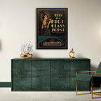 Modern interior with a green sideboard, gold chair, and framed poster on a white wall.