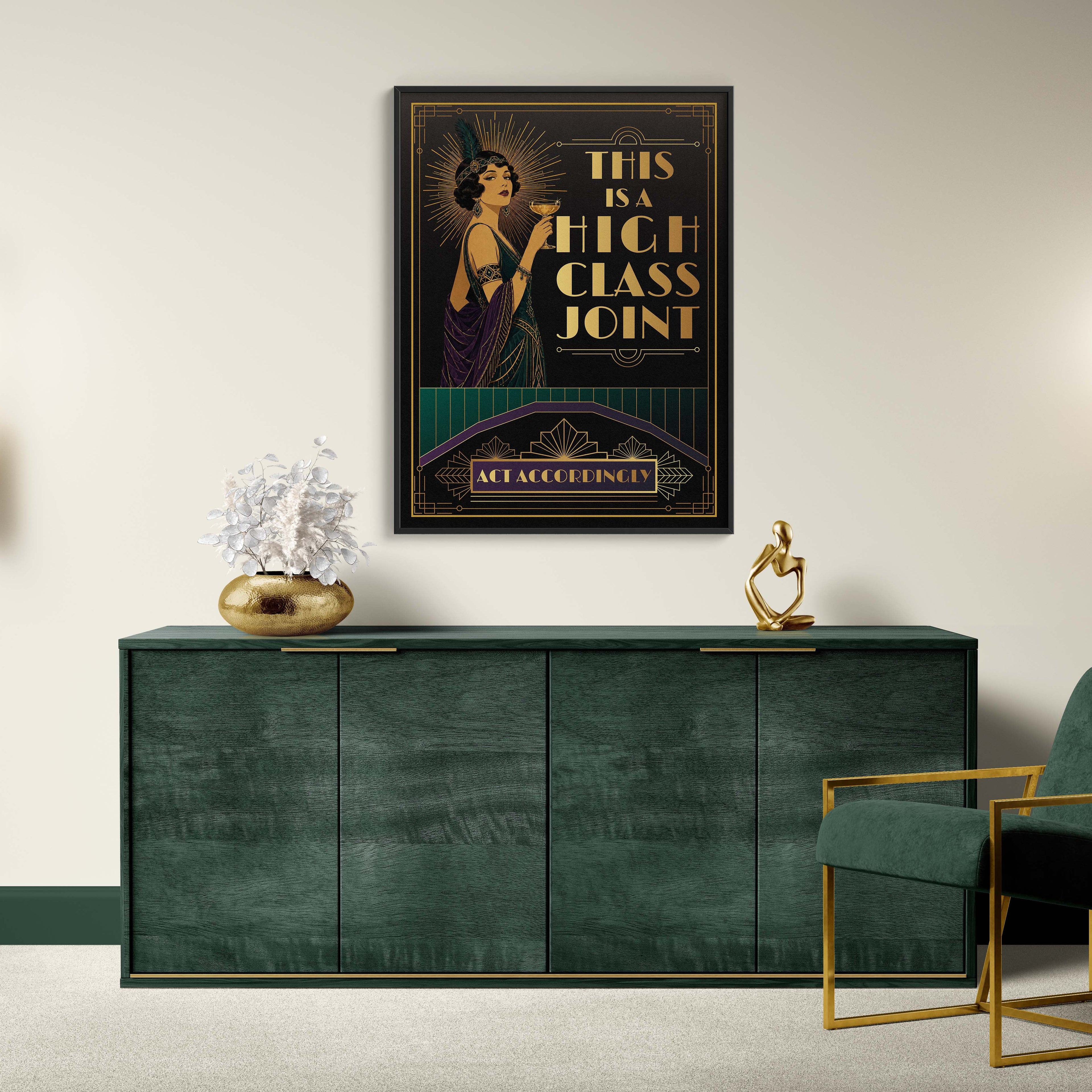 Modern interior with a green sideboard, gold chair, and framed poster on a white wall.